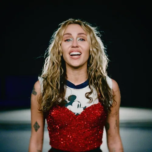 Miley Cyrus Rocks Custom Maison Margiela in New "Used to be Young" Music Video