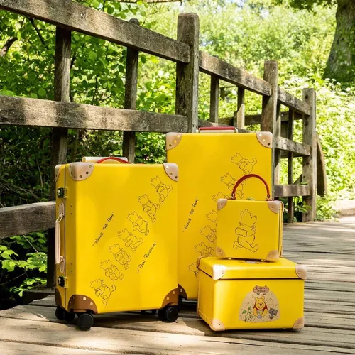 Globe-Trotter's Sweet Tribute: Winnie the Pooh Luggage Collection Celebrates Disney's Centennial