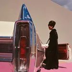 Benedetta Barzini in a Mink Coat Takes a Seat in a Cadillac Coupé de Ville