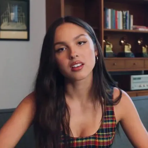 Olivia Rodrigo Answers Vogue's 73 Questions in Vintage Versace from Chloë Sevigny's Wardrobe